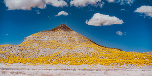 Golden Peak Under Azure Dreams