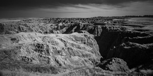 Shadows of the Earth: Rugged Elegance of the Badlands by Dream World Images