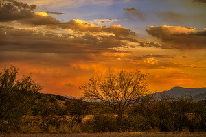 Burning Sky Over Silent Shadows by Dream World Images
