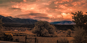 Solitary Vigil in a Fiery Twilight by Dream World Images
