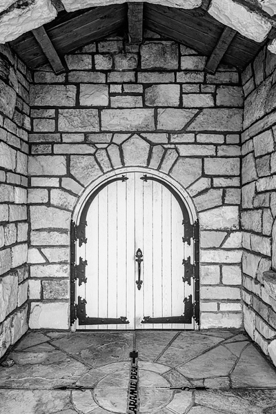 Whispers of Time: Capturing the Weathered Charm of a Wyoming Museum Door Print