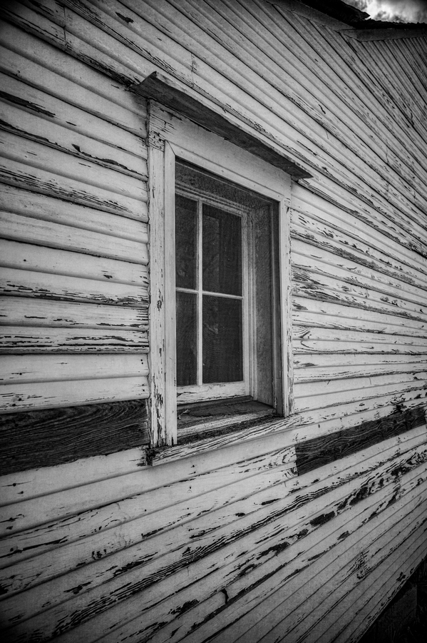 Echoes of the Past: A Weathered Reflections of an 1800s Farm window in Texas Print