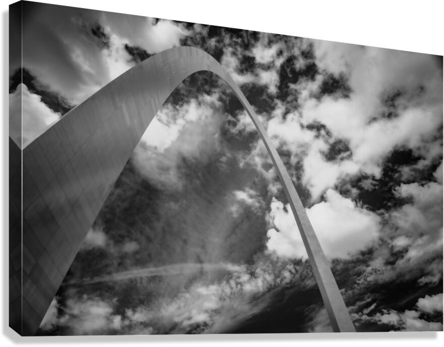 Sculpted Arch Amidst Dynamic Clouds Canvas Print