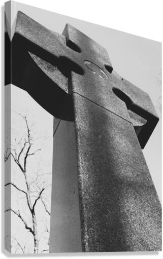Monumental Majesty: Exploring the Modern Stone Cross Sculpture Canvas Print