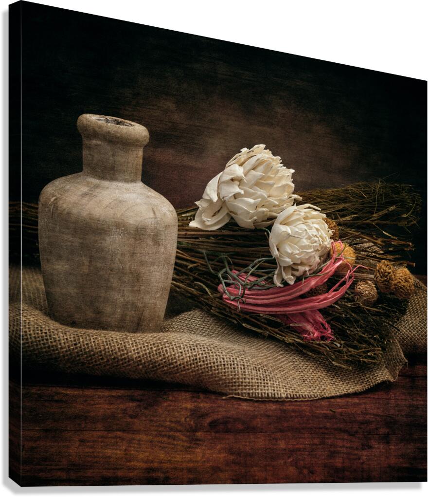 Rustic Elegance: Old Wooden Jar on Burlap with Flowers Reeds Canvas Print