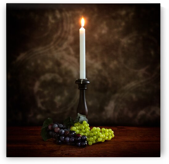 Vintage Illumination: Antique Candlestick with Grapes and Flame by Dream World Images