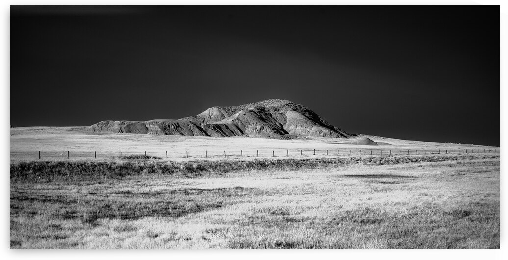 Shadows of the Earth: Lone Hill outside the Badlands by Dream World Images