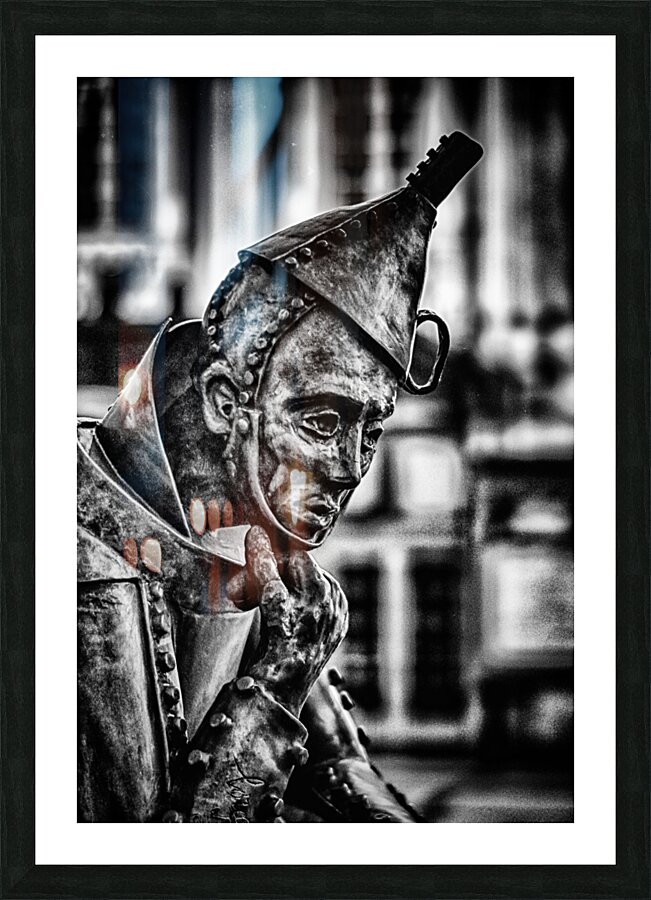 Cogitating Sculpture: Unveiling the Pondering of the Thinking Tin Man in York  Framed Print Print
