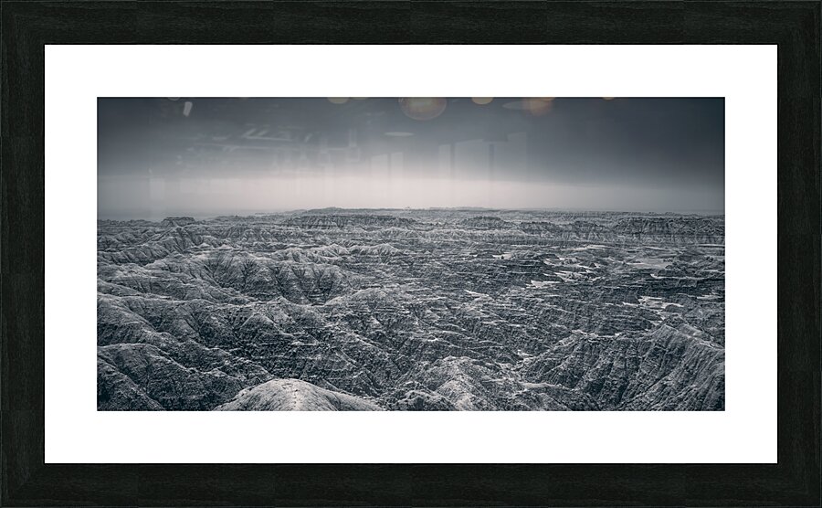 Shadows of the Earth: Ghostly Vista of the Badlands Picture Frame print