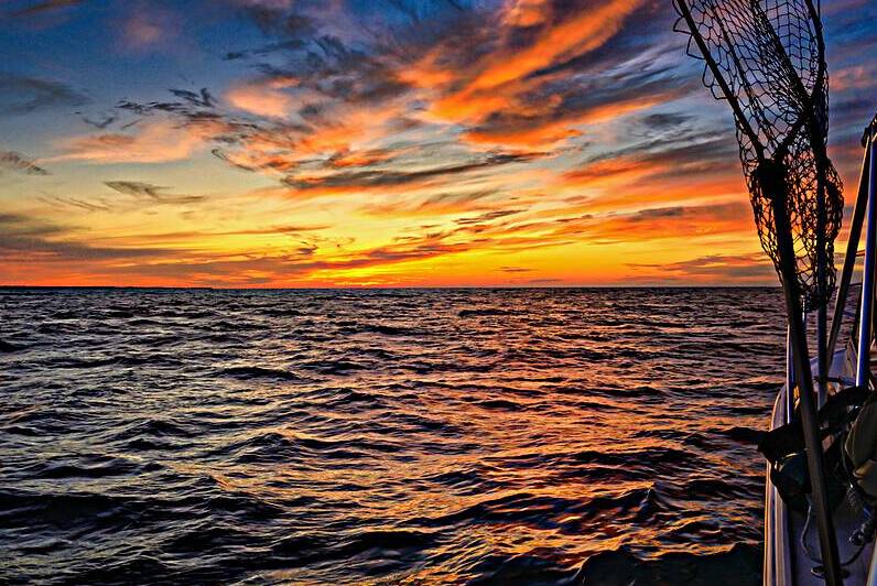 Sailing into Octobers Glow: A Maritime Adventure on the Waves by Dream World Images