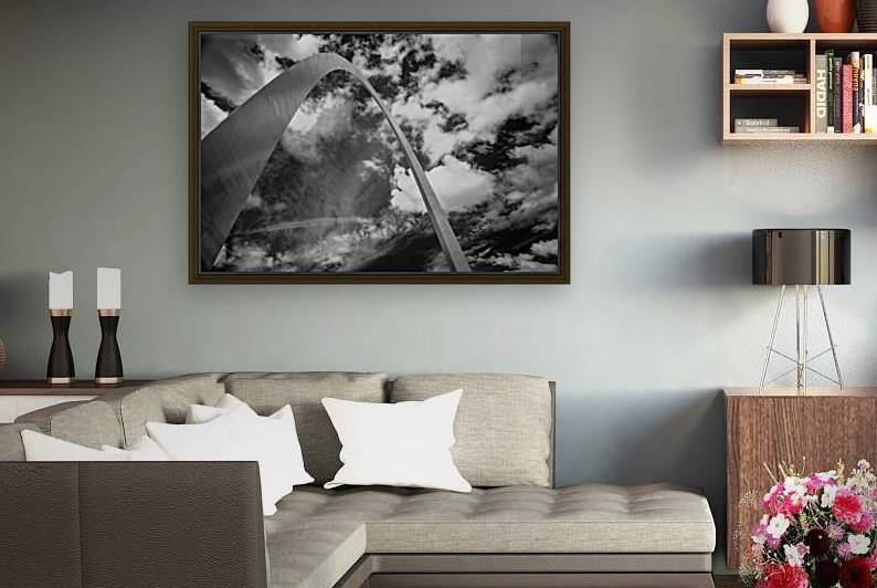 Sculpted Arch Amidst Dynamic Clouds by Dream World Images